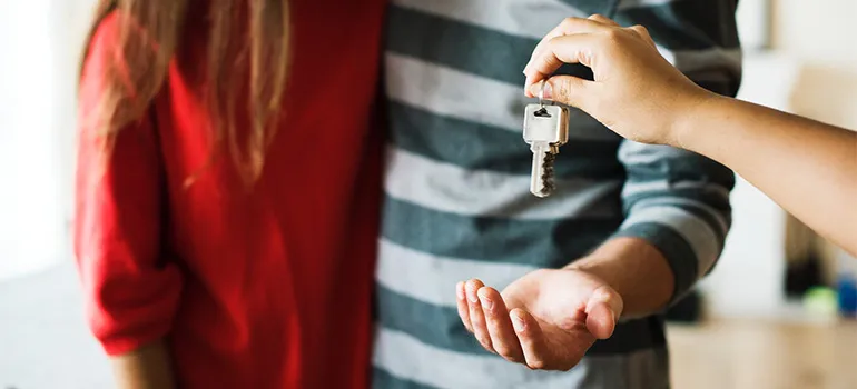 People receiving a set of keys