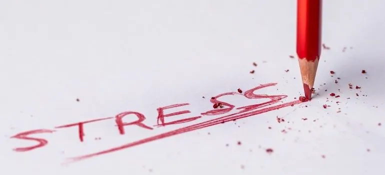 The word STRESS written on a piece of paper.