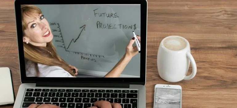A projection of future predictions on a laptop screen.