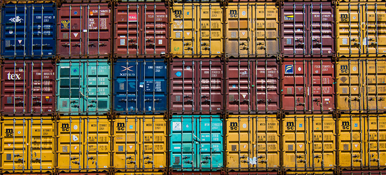 Rows upon rows of shipping crates stacked.