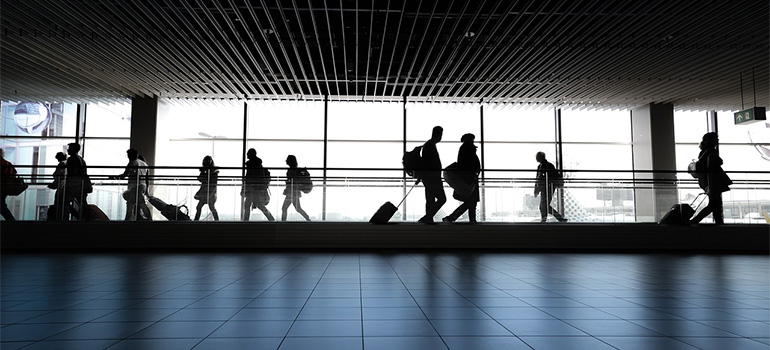 People on an airport avoiding common issues with global moves.