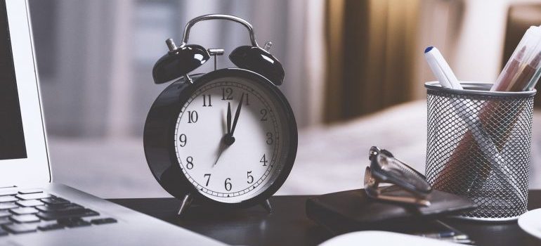 A black alarm clock.