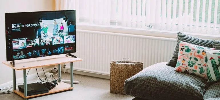 TV on in a living room.