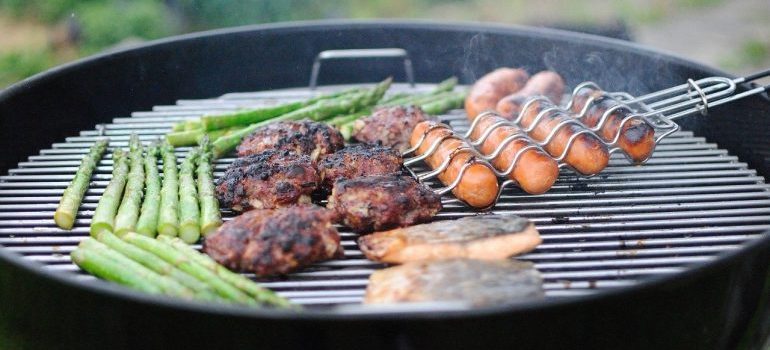 Grilling meat and vegetables.