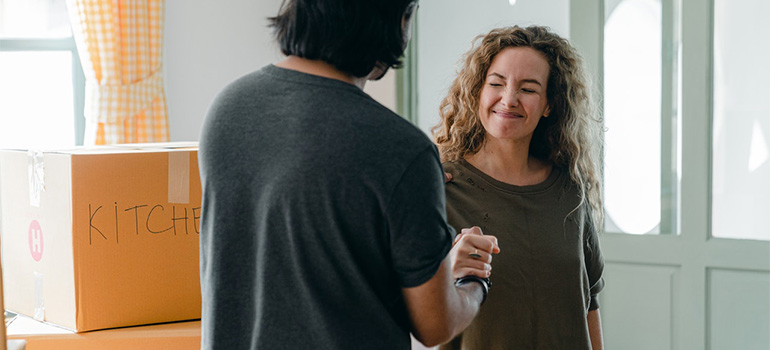 A man and a woman shaking hands