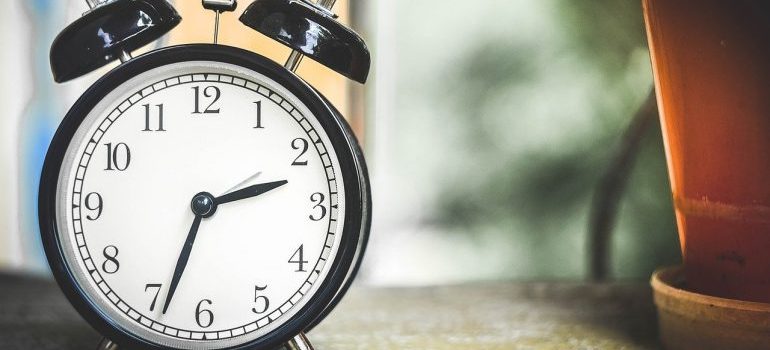 A black alarm clock.