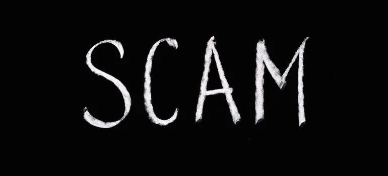 scam text on the black background