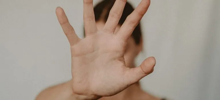 man holding his palm outstretched