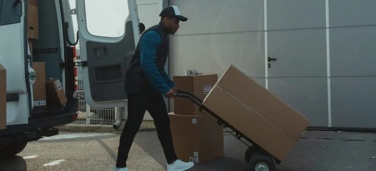 man using a dolly