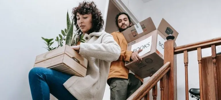 a couple trying to avoid clutter after moving