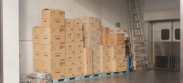 Stacked pile of moving boxes.
