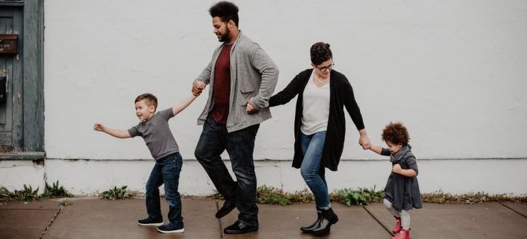 A family going out for a walk after moving from Bellevue to Lynnwood.