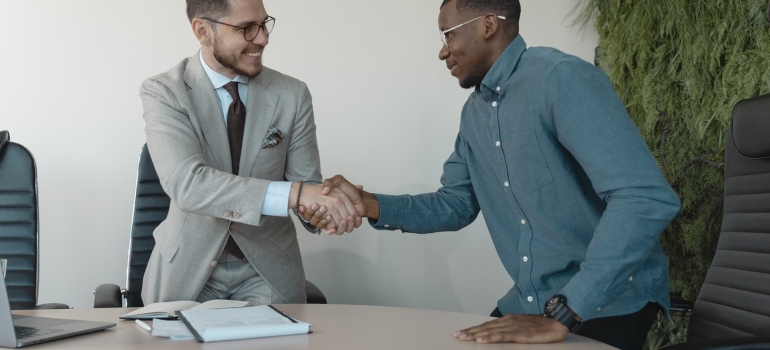 two people shaking hands
