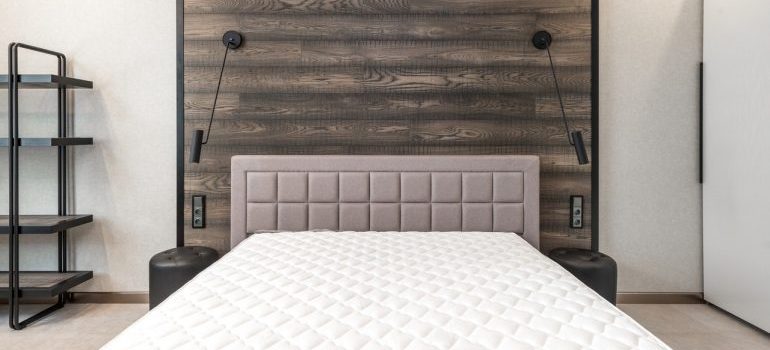a mattress on a bed