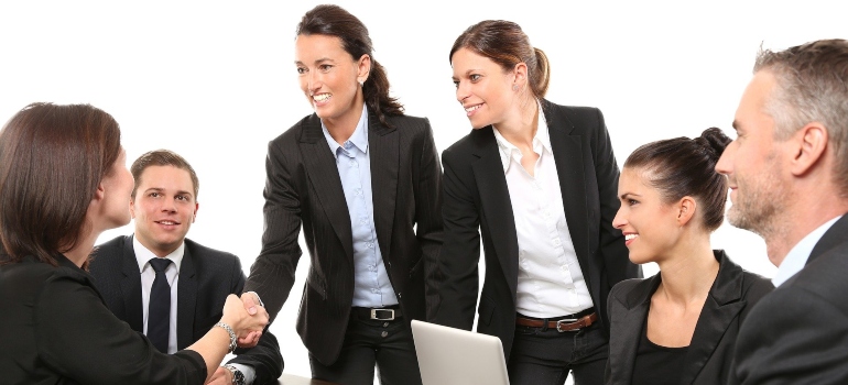 people sealing a deal