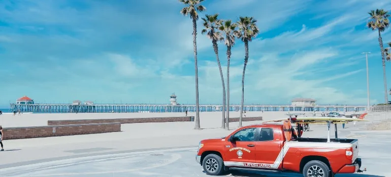 a red car at the beach