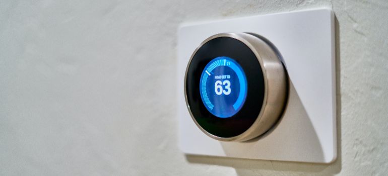digital thermostat on a wall