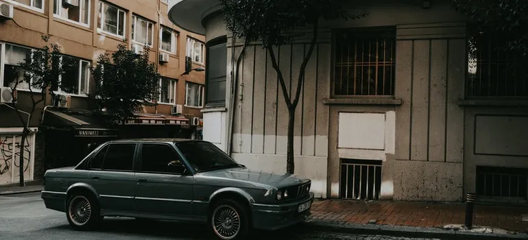 Car in front of a building