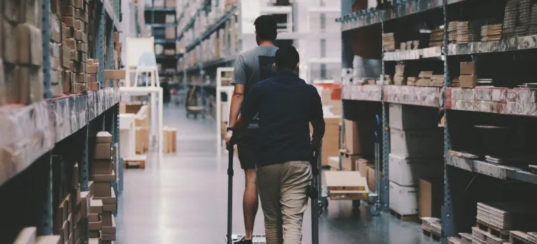 two guys in a storage unit
