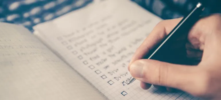 person making a overnight move checklist