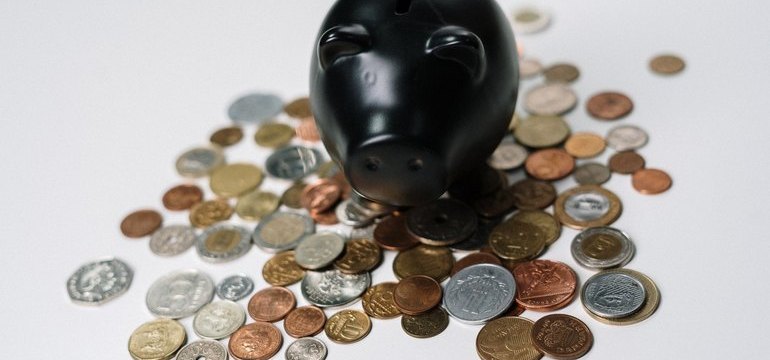 a piggy bank and pennies