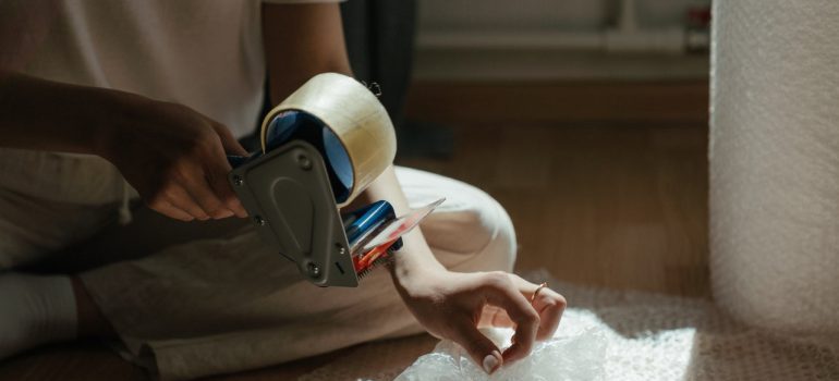 woman using duct tape