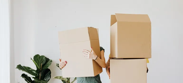 couple working hard to relocate