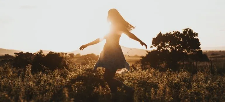 A woman walking in the fields
