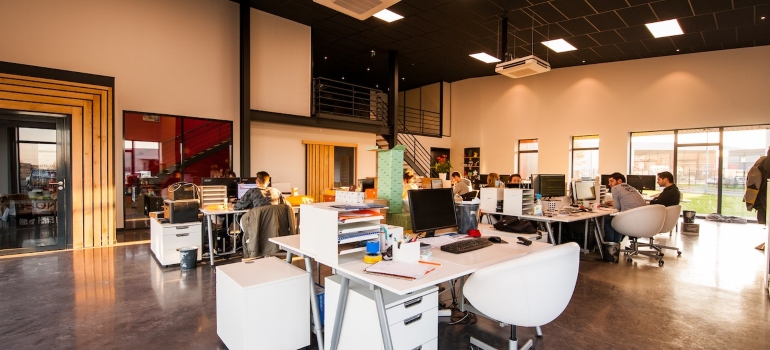 Open office space with furniture and people