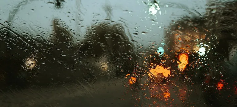 a window covered in rain during moving from Kirkland to Redmond
