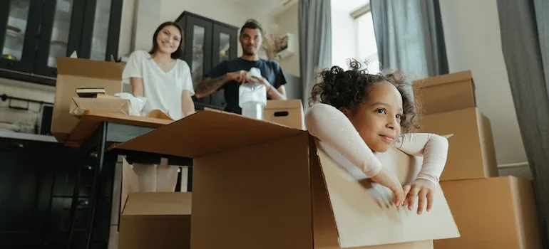 a family of three packing and considering where do Kirkland families move