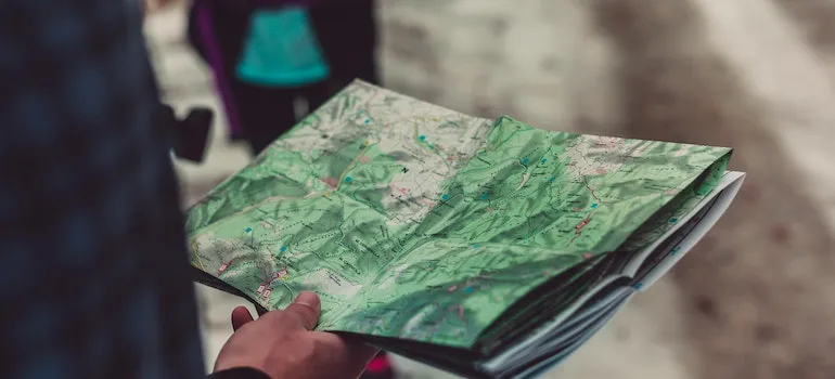 A new Seattle resident holding a map of the city