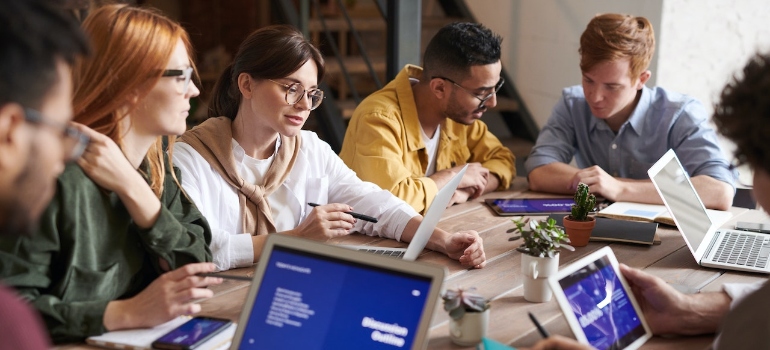 A team brainstorming about decluttering your Seattle office